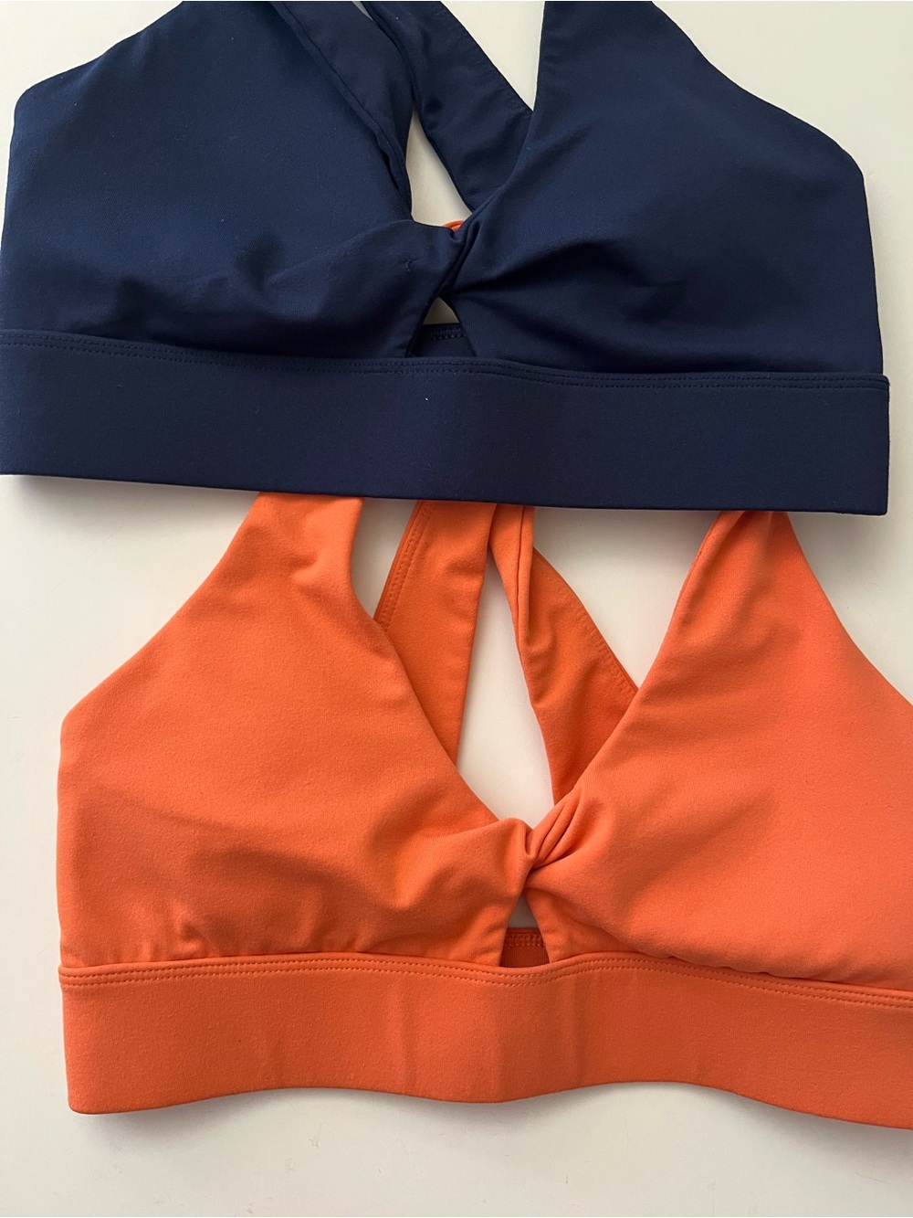 Fabletics | Dual-Pack Cross-Back Sports Bras in Orange & Navy - Picture 4 of 4